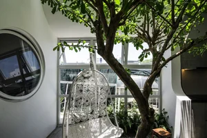 Stunning Fluid Architecture: The Flowing River House Design Captivates Da Nang - image 3