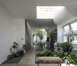 Stunning Fluid Architecture: The Flowing River House Design Captivates Da Nang - image 6