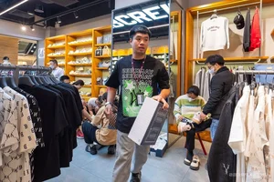 Black Friday Shopping Craze: Crowds Flock to Malls for Luxury Deals - image 11