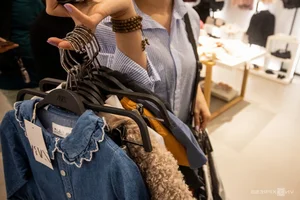 Black Friday Shopping Craze: Crowds Flock to Malls for Luxury Deals - image 4