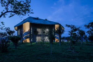 The Unique Kaleidoscope Glass Building Nestled Between Mountains and Sea - image 7