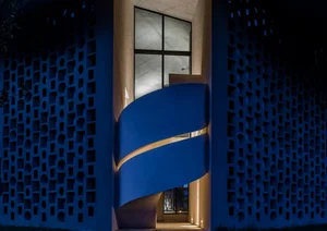 The Unique Kaleidoscope Glass Building Nestled Between Mountains and Sea - image 9