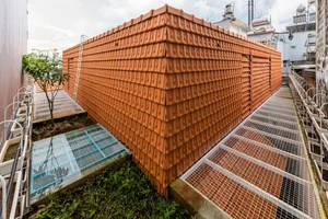 Sustainable Living in Lam Dong: The House with the Inverted Tile Roof - image 2