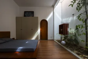 Sustainable Living in Lam Dong: The House with the Inverted Tile Roof - image 4