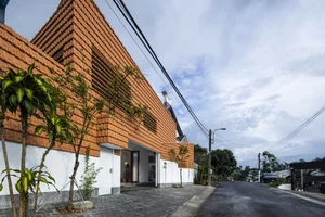 Sustainable Living in Lam Dong: The House with the Inverted Tile Roof - image 6