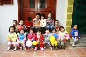 Celebrating Lunar New Year with a Massive 300-Member Family in Hanoi - image 0