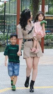 Inspiring Post-Pregnancy Plastic Surgery Transformation: Standing Confidently Beside Miss Grand Thuy Tien - image 3