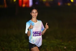 Vy Ly Triumphs in the Men's 21km Race at VnExpress Marathon Ha Long - image 2