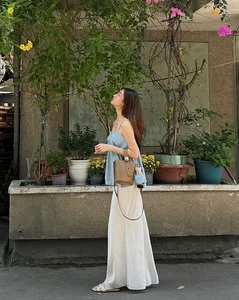 How Vietnamese Celebrities Elevate Their Style with Classic A-Line Midi Skirts - image 3