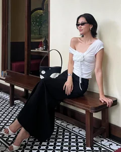 How Vietnamese Celebrities Elevate Their Style with Classic A-Line Midi Skirts - image 5