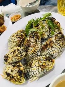 Mekong Delta's Humble Fish: Transformed into an Exquisite Grilled Delicacy for Food Lovers. - image 5