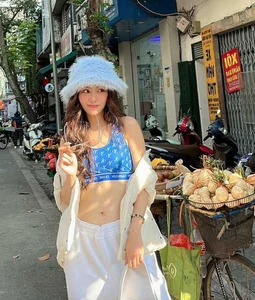 Saigon Street Style: Local Beauty Turns Heads with Chic Summer Outfit and Impressive Long Legs - image 0