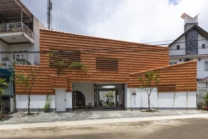 The Tile House: A Nostalgic and Weather-Responsive Masterpiece in Bao Loc - image 1