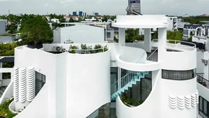 Modern Tube House Design: Open Concept Featuring Unique Fish Scale Ventilation Bricks - image 4