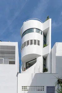 Modern Tube House Design: Open Concept Featuring Unique Fish Scale Ventilation Bricks - image 0