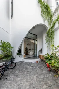 Modern Tube House Design: Open Concept Featuring Unique Fish Scale Ventilation Bricks - image 1
