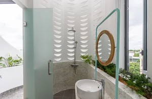 Modern Tube House Design: Open Concept Featuring Unique Fish Scale Ventilation Bricks - image 12