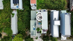 Modern Tube House Design: Open Concept Featuring Unique Fish Scale Ventilation Bricks - image 15