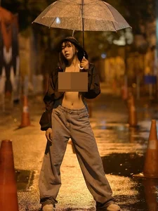 Redefining Modern Street Style: Minimalist Fashion Aesthetics and the Art of Rainy Day Photography - image 6