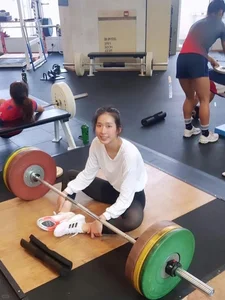 Beautiful PhD Law Graduate Wins Historic Olympic Gold Medal - image 2