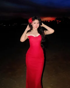 Quyen Linh's Daughter Stuns in Mysterious Red Bodycon Dress - image 7