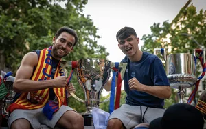 Catalonia Celebrates: FC Barcelona's Historic Triple Trophy Victory Parade - image 11
