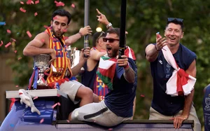 Catalonia Celebrates: FC Barcelona's Historic Triple Trophy Victory Parade - image 15