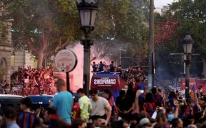 Catalonia Celebrates: FC Barcelona's Historic Triple Trophy Victory Parade - image 10
