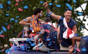Catalonia Celebrates: FC Barcelona's Historic Triple Trophy Victory Parade - image 17