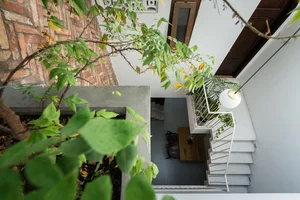 Stunning Saigon Townhouse Renovation: Modern Architecture Meets Urban Living - image 3