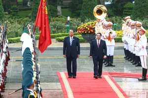 Official Welcome Ceremony for the Prime Minister of Japan in Vietnam - image 9