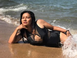 Actress Kieu Trinh Confidently Flaunts Her Curves in Bikini at Age 50 - image 5
