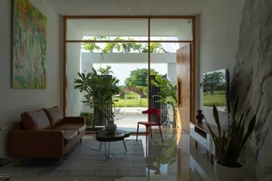 Modern Three-Story House with Traditional Red Tile Roof Design - image 2