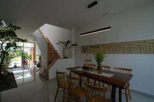 Modern Three-Story House with Traditional Red Tile Roof Design - image 8