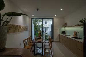 Modern Three-Story House with Traditional Red Tile Roof Design - image 10