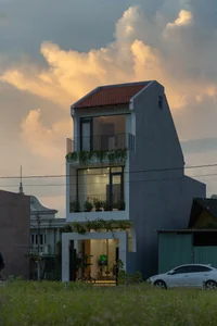 Modern Three-Story House with Traditional Red Tile Roof Design - image 11