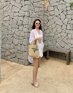 Vietnamese Celebrities Rocking the Luxury Straw Bag Trend - image 2