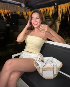 Vietnamese Celebrities Rocking the Luxury Straw Bag Trend - image 10