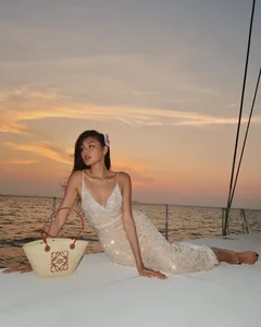 Vietnamese Celebrities Rocking the Luxury Straw Bag Trend - image 4