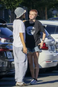 Shiloh Jolie-Pitt Rocking Bold Pink Buzz Cut Fashion - image 2