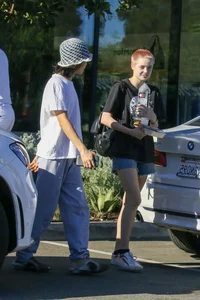 Shiloh Jolie-Pitt Rocking Bold Pink Buzz Cut Fashion - image 5