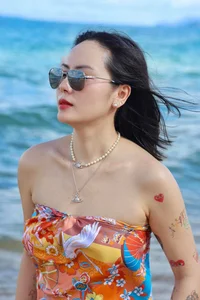 Phuong Linh Sets the Beach Ablaze With Her Bold Scarf-Top Look - image 9