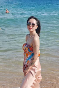 Phuong Linh Sets the Beach Ablaze With Her Bold Scarf-Top Look - image 2