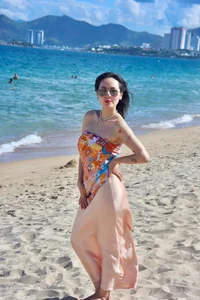 Phuong Linh Sets the Beach Ablaze With Her Bold Scarf-Top Look - image 3