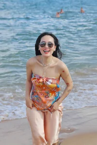 Phuong Linh Sets the Beach Ablaze With Her Bold Scarf-Top Look - image 0