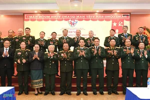 Commemorating the Traditional Day of Vietnamese Volunteer Soldiers and Experts in Laos - image 1