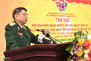 Commemorating the Traditional Day of Vietnamese Volunteer Soldiers and Experts in Laos - image 8