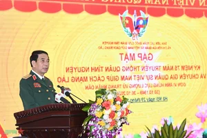 Commemorating the Traditional Day of Vietnamese Volunteer Soldiers and Experts in Laos - image 2