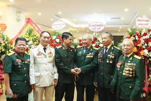 Commemorating the Traditional Day of Vietnamese Volunteer Soldiers and Experts in Laos - image 9