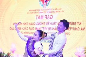 Commemorating the Traditional Day of Vietnamese Volunteer Soldiers and Experts in Laos - image 3